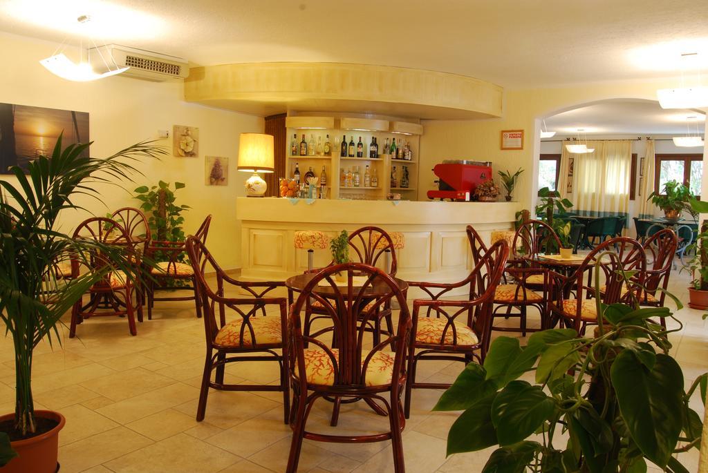 Hotel Mon Repos Baja Sardinia Bagian luar foto