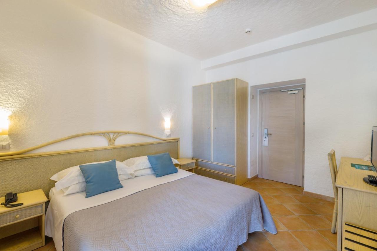 Hotel Mon Repos Baja Sardinia Bagian luar foto