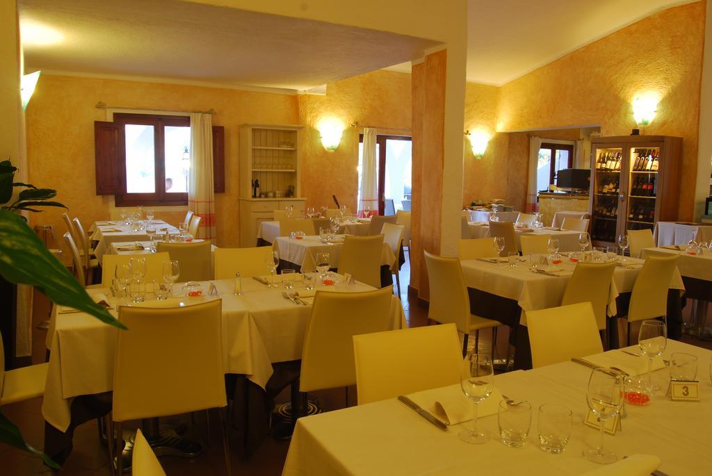 Hotel Mon Repos Baja Sardinia Bagian luar foto